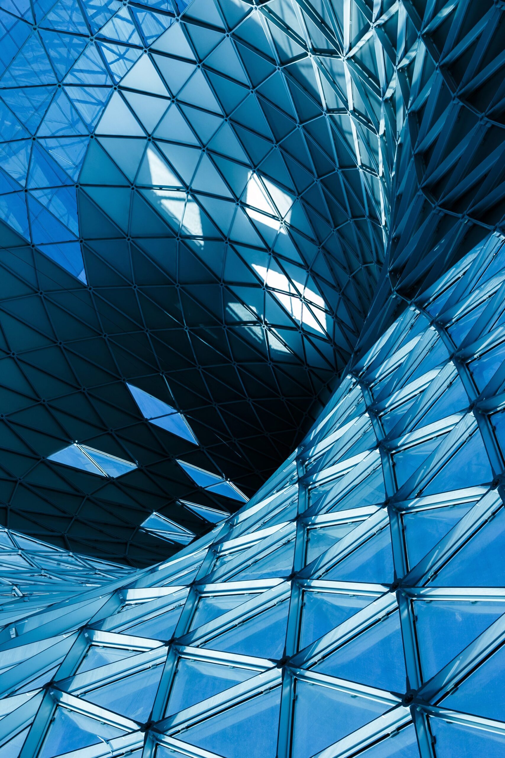 Glass facade of a modern corporate office building