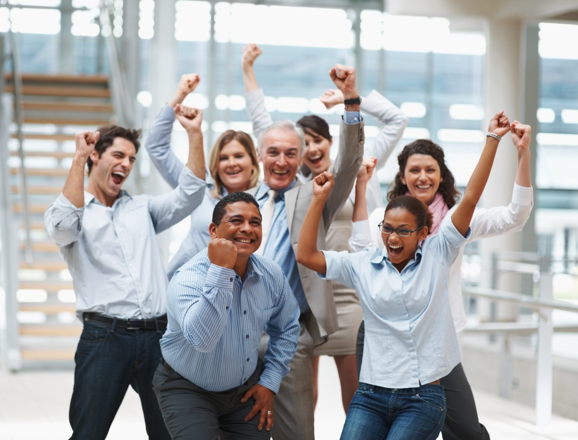 Business team celebrating over finalization of a contract