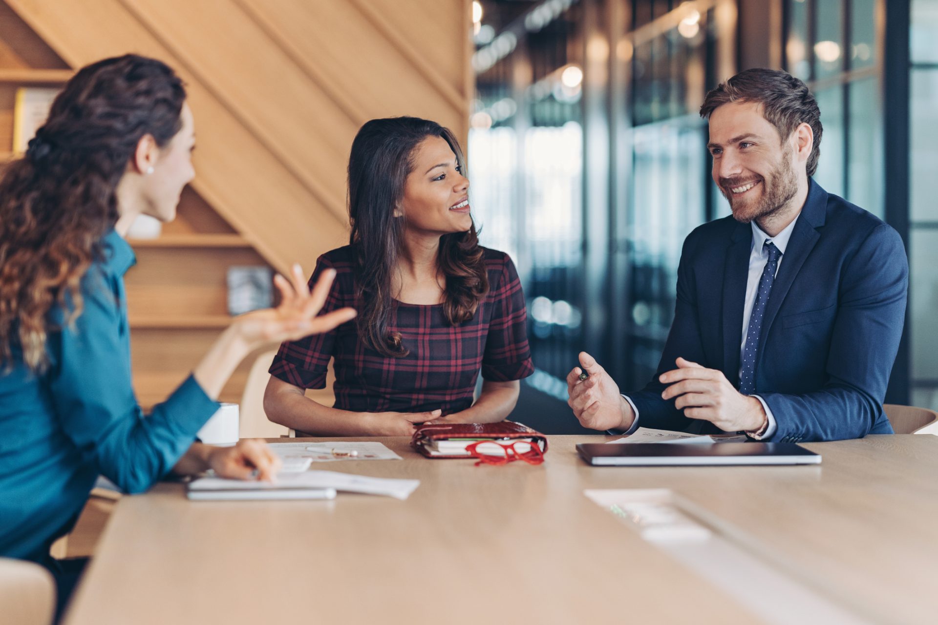 Multiracial group of entrepreneurs discussing business